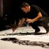 Philippe Dupuy dessine sur scène pendant le DJ set